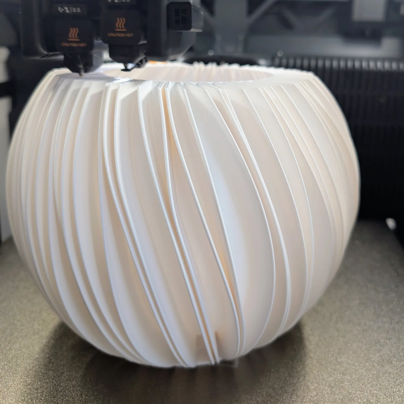 Rima lamp form being built layer by layer on a 3D printer